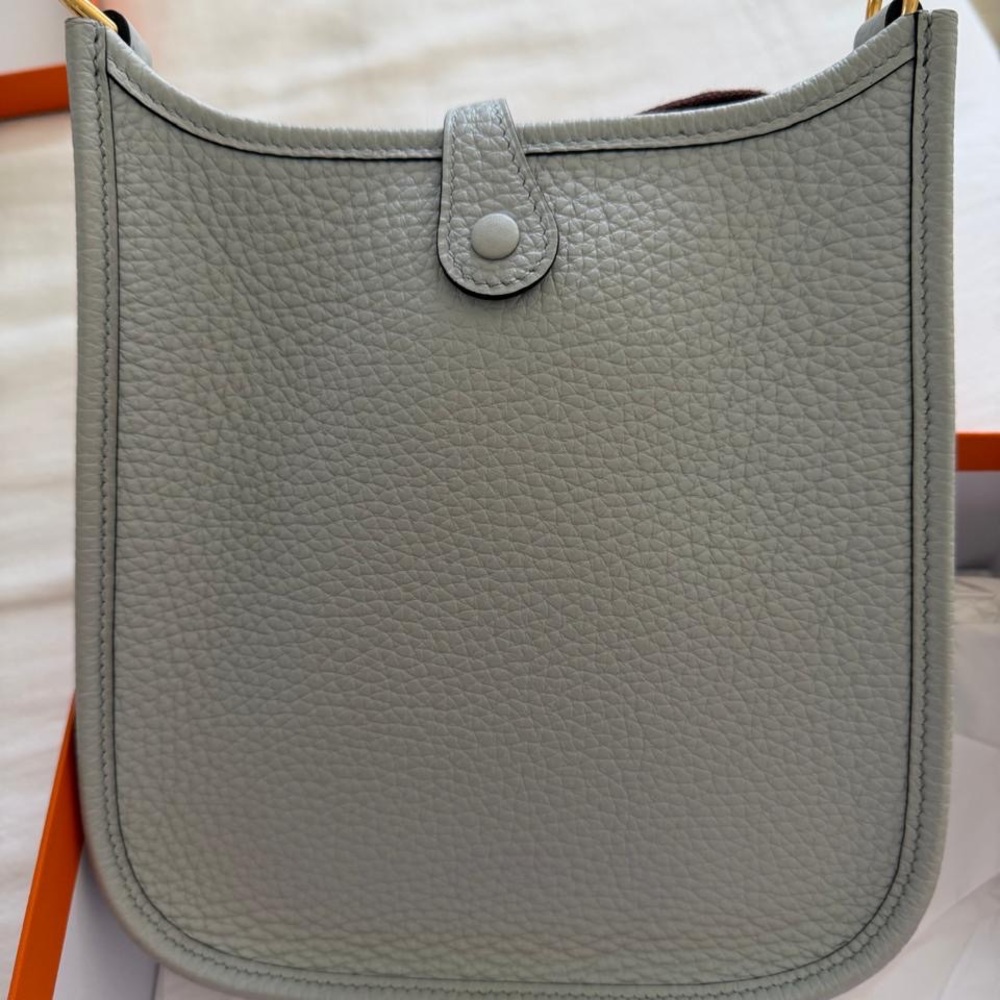 Hermès
Bleu Pale Clemence Mini Evelyne II TPM 16 Gold Hardware - Picture 7 of 7